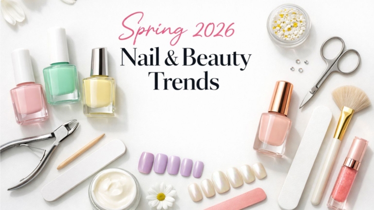 Spring 2026 nail and beauty trends flat lay with pastel nail polishes, manicure tools, floral accents, and minimalist white background styling.